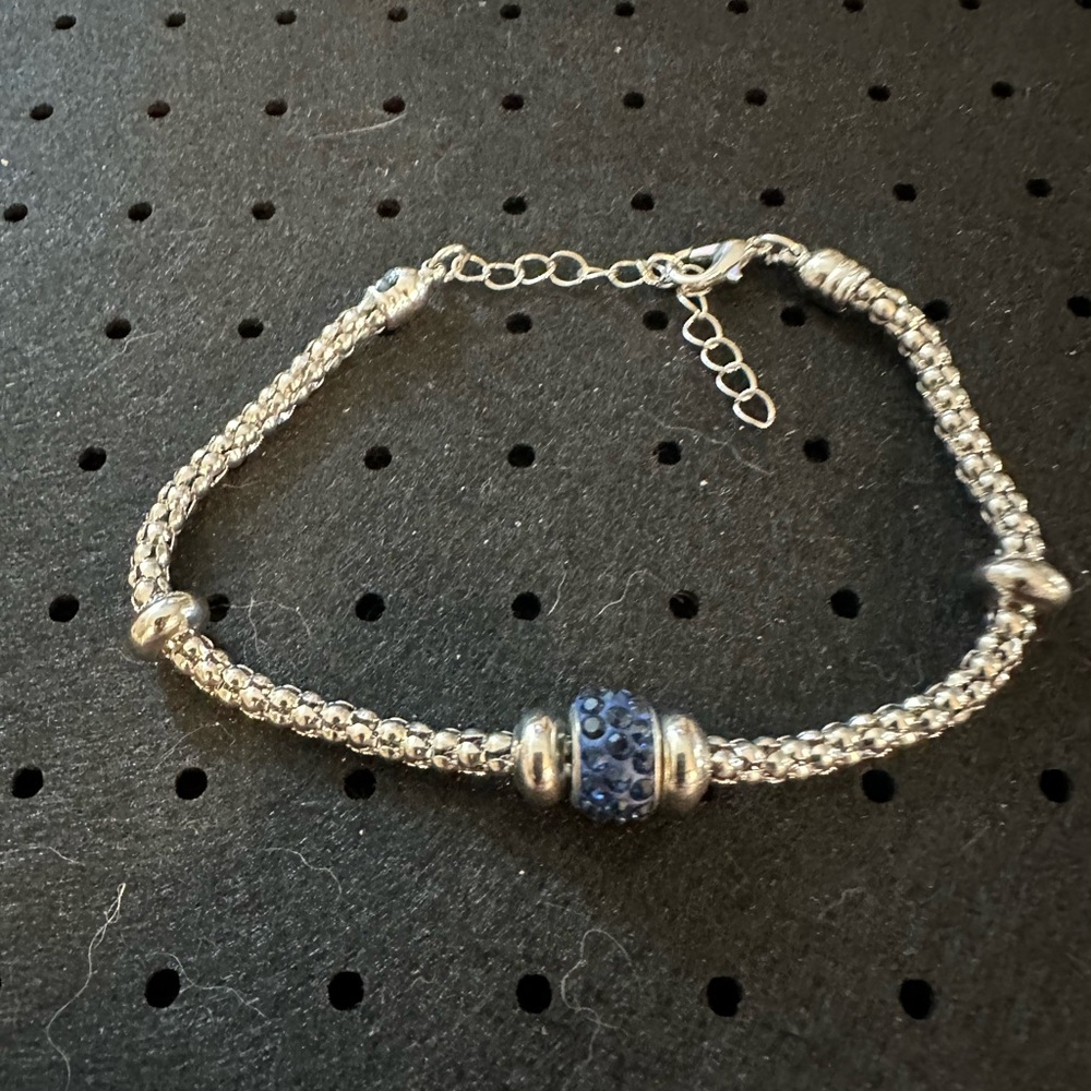 Silver Braided Bracelet with Blue Crystal Accent